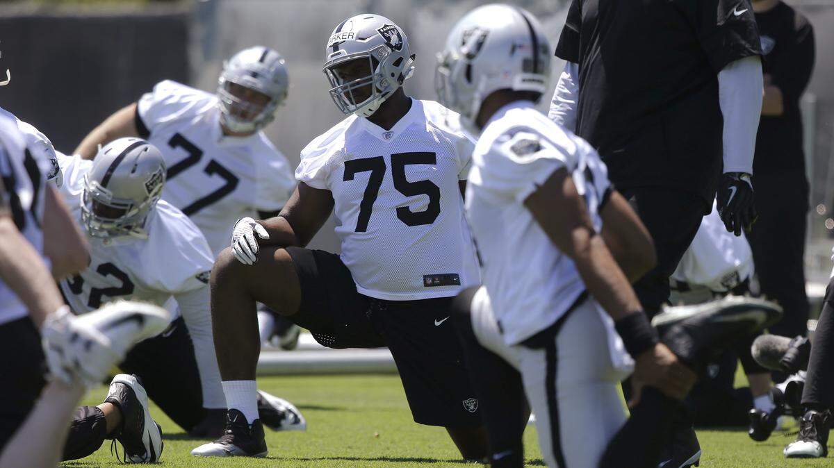 Oakland Raiders rookie tackle Brandon Parker (75) stretches during the NFL football team’s minicamp Tuesday, June 12, 2018, in Alameda, Calif.