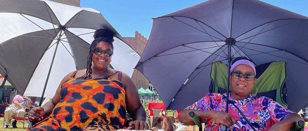 Tiffany Lighter, left, and her mother Audrey Lighter say they enjoy going to music festivals and have supported APEX events in Elk Grove as they watched the inaugural Capital City Jazz Fest in Old Sacramento on Saturday.