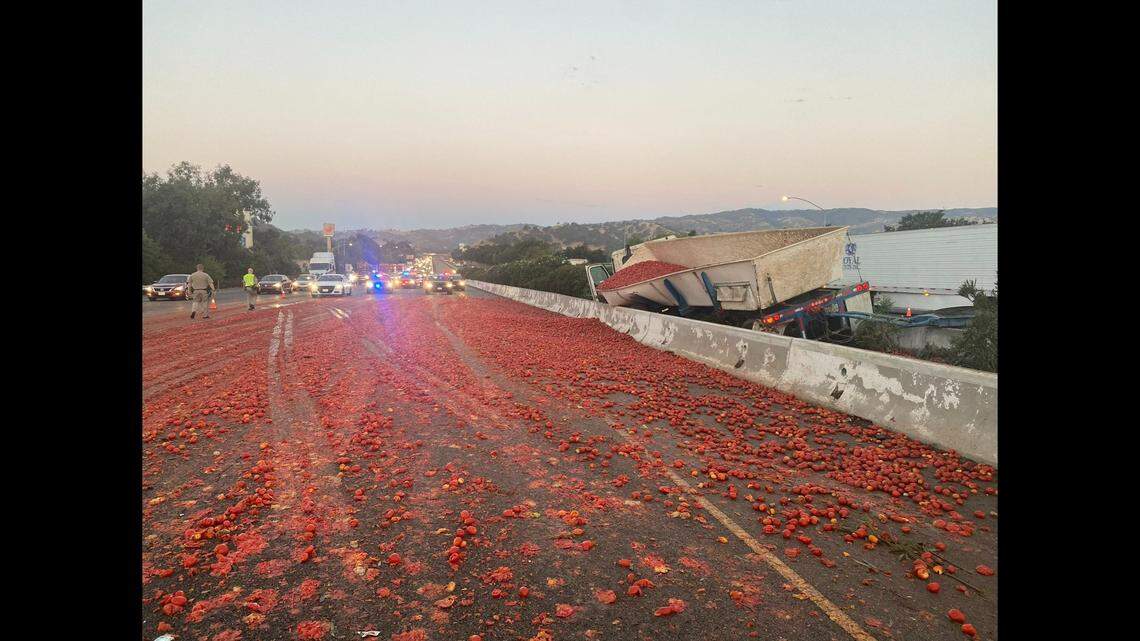 Thousands of spilled tomatoes close Interstate 80 between Sacramento and California after a semi hit a center divider, California officials say.