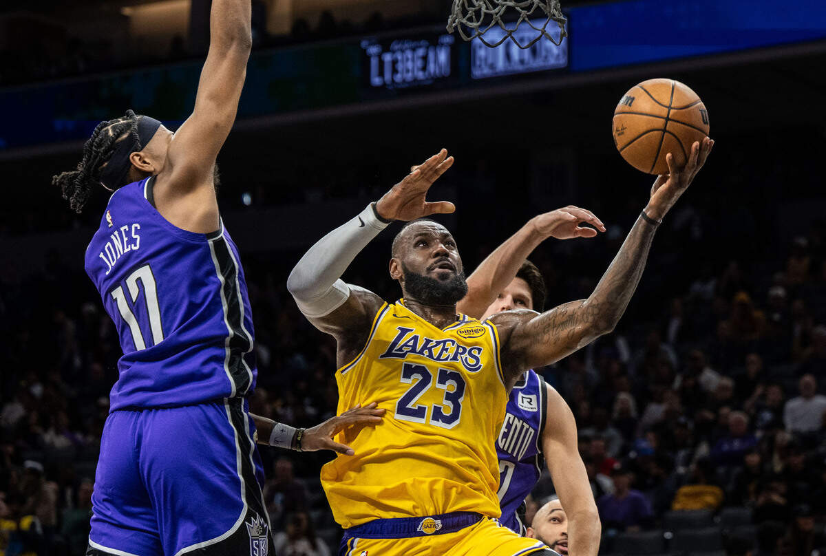 Los Angeles Lakers forward LeBron James (23) drives to the basket against Sacramento Kings center Isaac Jones (17) during an NBA game on Thursday at Golden 1 Center. 