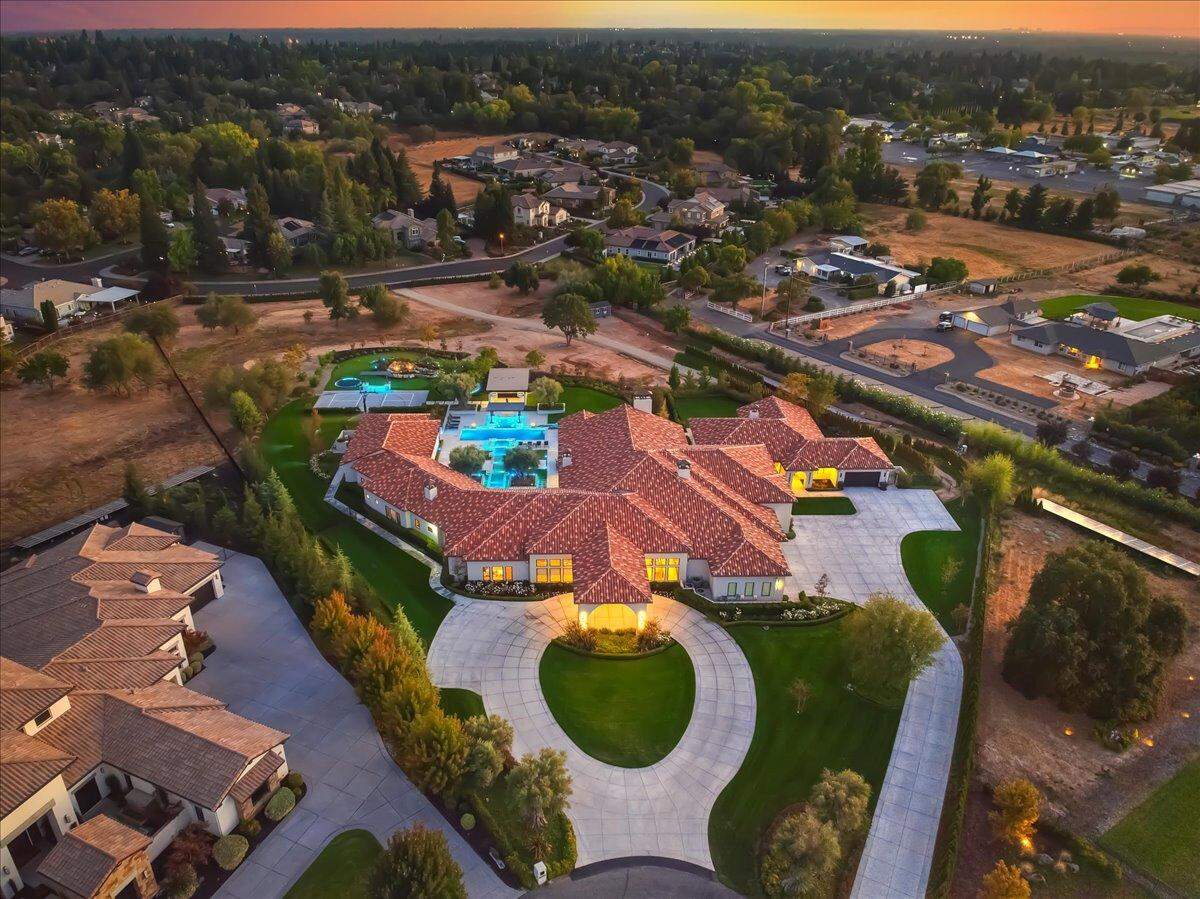 The sprawling Granite Bay, California, compound offers 6 bedrooms, 7.5 baths, and more than 11,000 square feet of single-story modern luxury living.