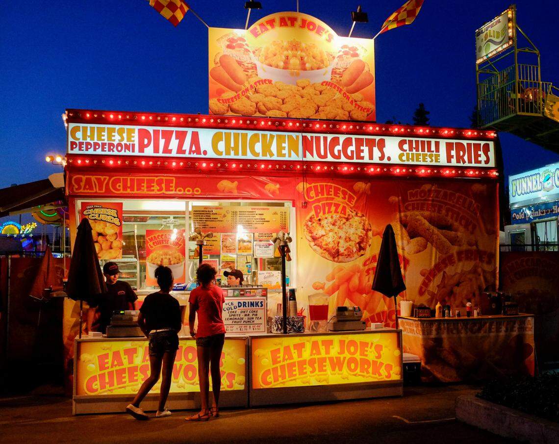 Fairgoers wait to get food at the State Fair at Cal Expo in 2012.