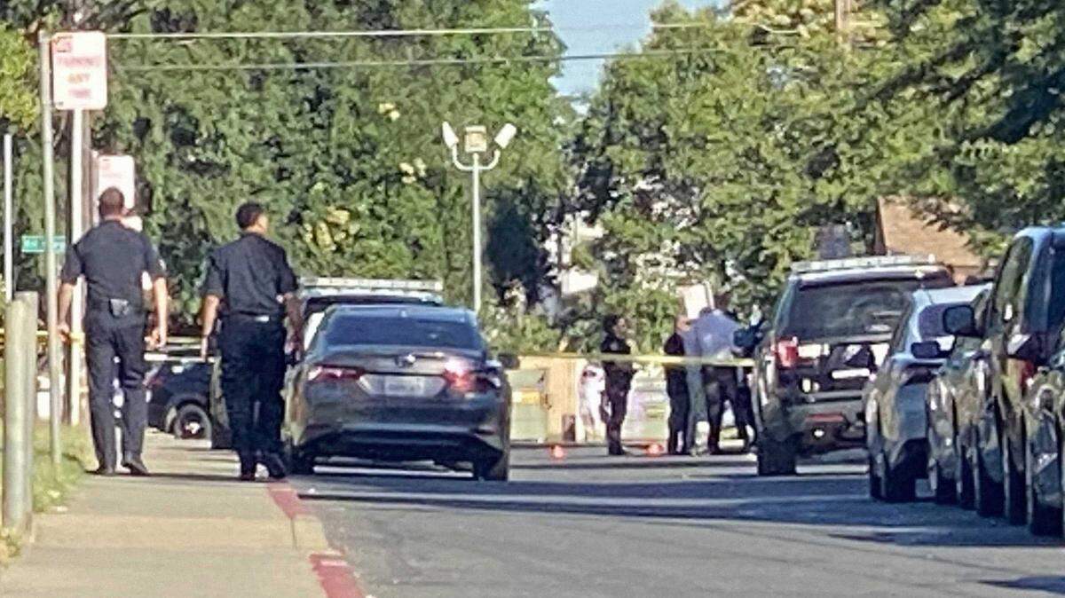 The scene markers at the intersection of Revere and Kit Carson streets mark where an 8-year-old was shot in Upper Land Park on Tuesday, July 2, 2024.
