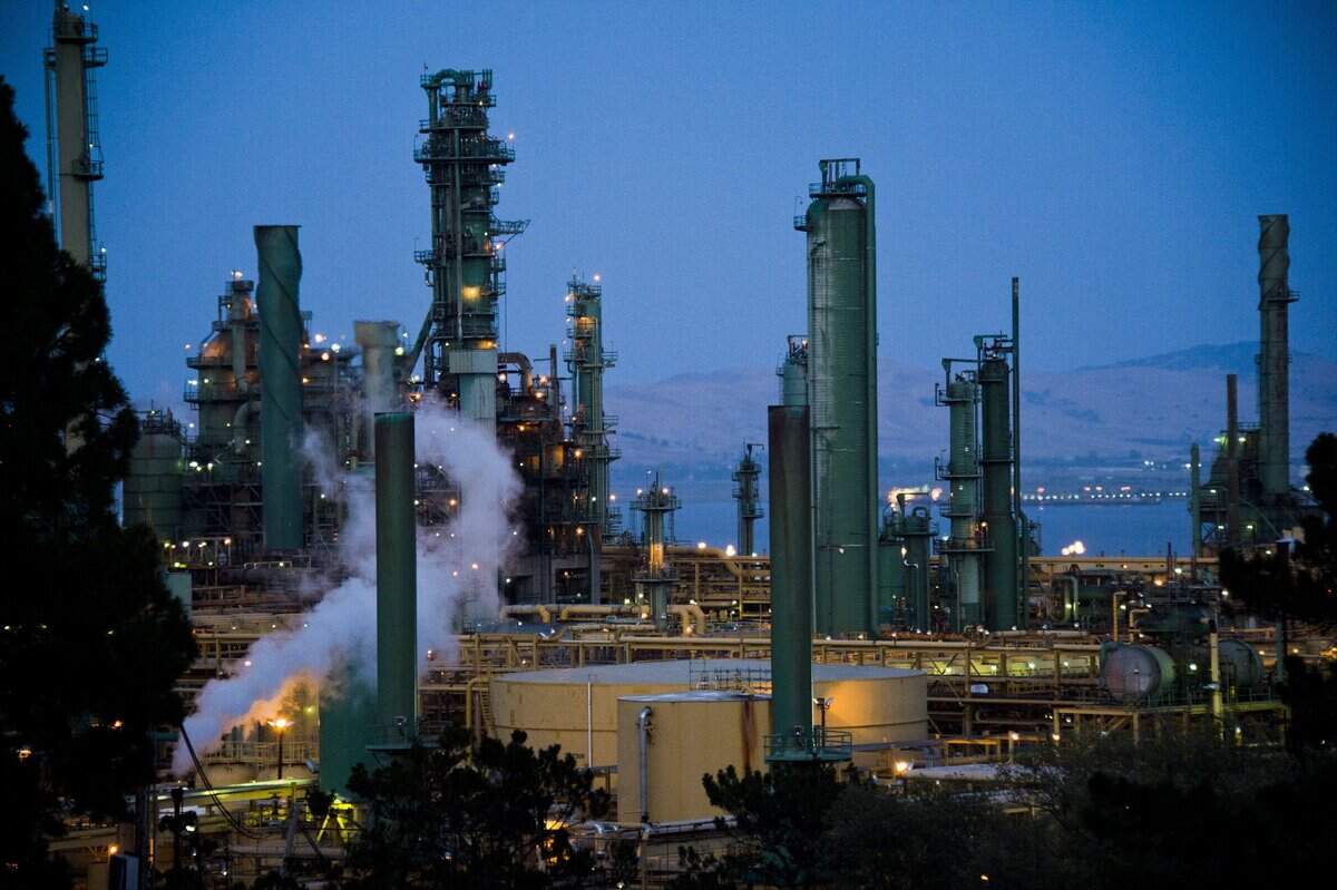 The Valero Benicia Refinery glows at night in 2014. Only six states produce more oil than California.