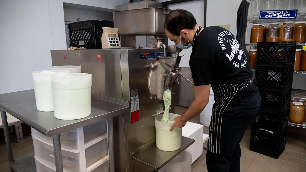 Cody Flores-Jauregui makes ice cream at Leatherby’s Family Creamery on Thursday, Dec 3, 2020 in Arden Arcade.