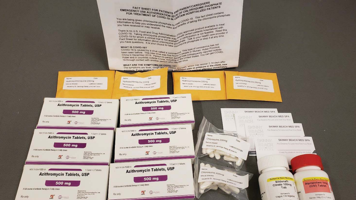 In this photo from April 9, 2020, azithromycin tablets, Xanax, Viagra, hydroxychloroquine and chloroquine is shown. A doctor in San Diego, California, is accused of selling these drugs as part of a COVID-19 treatment kit, prosecutors said.
