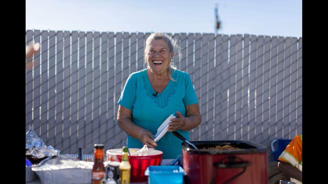 Norma Thornton serves food to those in need.