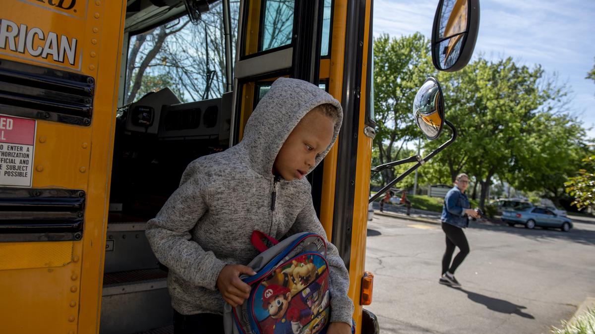 Children who were once homeless are dropped off after school at the Saint John's program for Real Change, a transitional housing center for woman and children.