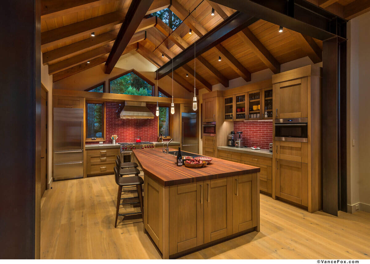 The centerpiece in the kitchen is this mahogany butcher block island.