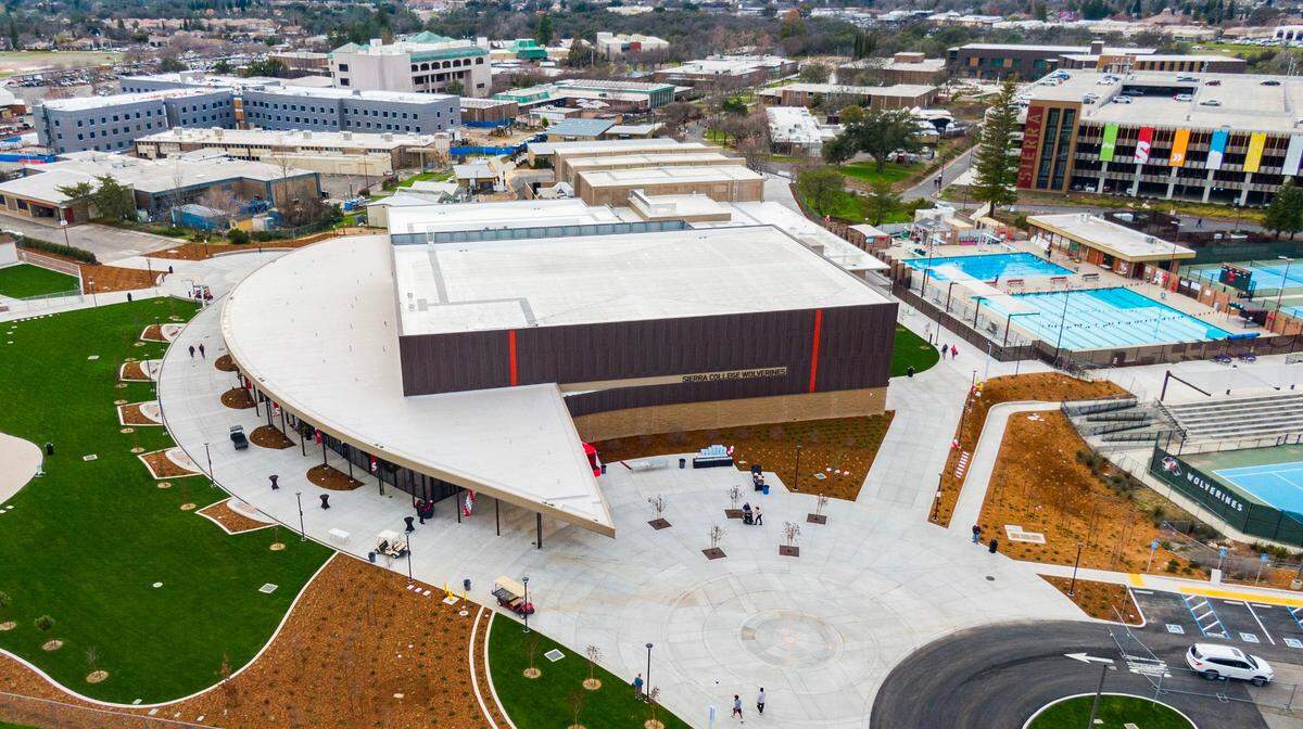 The new Sierra College gymnasium welcomes guests for its first sports competitions on Tuesday, Feb. 11, 2025, as the Wolverines host Santa Rosa in back-to-back men’s and women’s basketball games at the Rocklin Campus. The 81,000-square-foot facility replaces the 1960s-era gym, attached to the new structure at center top, which has been repurposed into a wrestling and weightlifting facility.