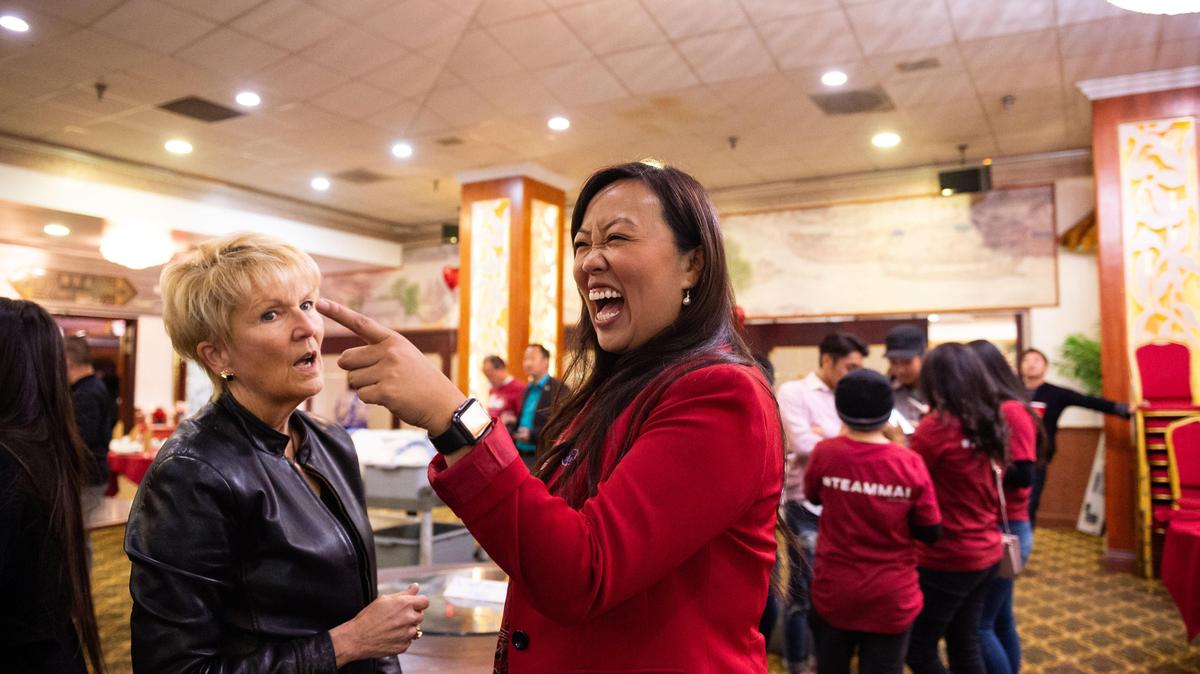 Mai Vang smiles as she catches campaign supporters, friends and family dancing while they gather at 2378 Florin Road to watch results in the Sacramento City Council District 8 election on primary day Tuesday, March 3, 2020, in Sacramento. Campaign volunteer Wendy Hoyt, left, of Sacramento, said she strongly supports Vang for the important role in District 8, which covers covers Meadowview, Parkway and Valley Hi in South Sacramento.
