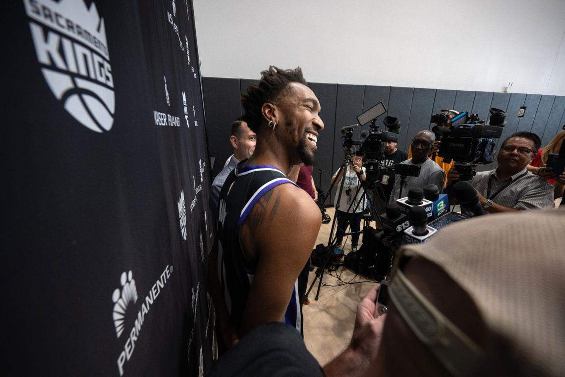 Sacramento Kings guard Malik Monk (0) shares a smile with the press during media day on Monday.