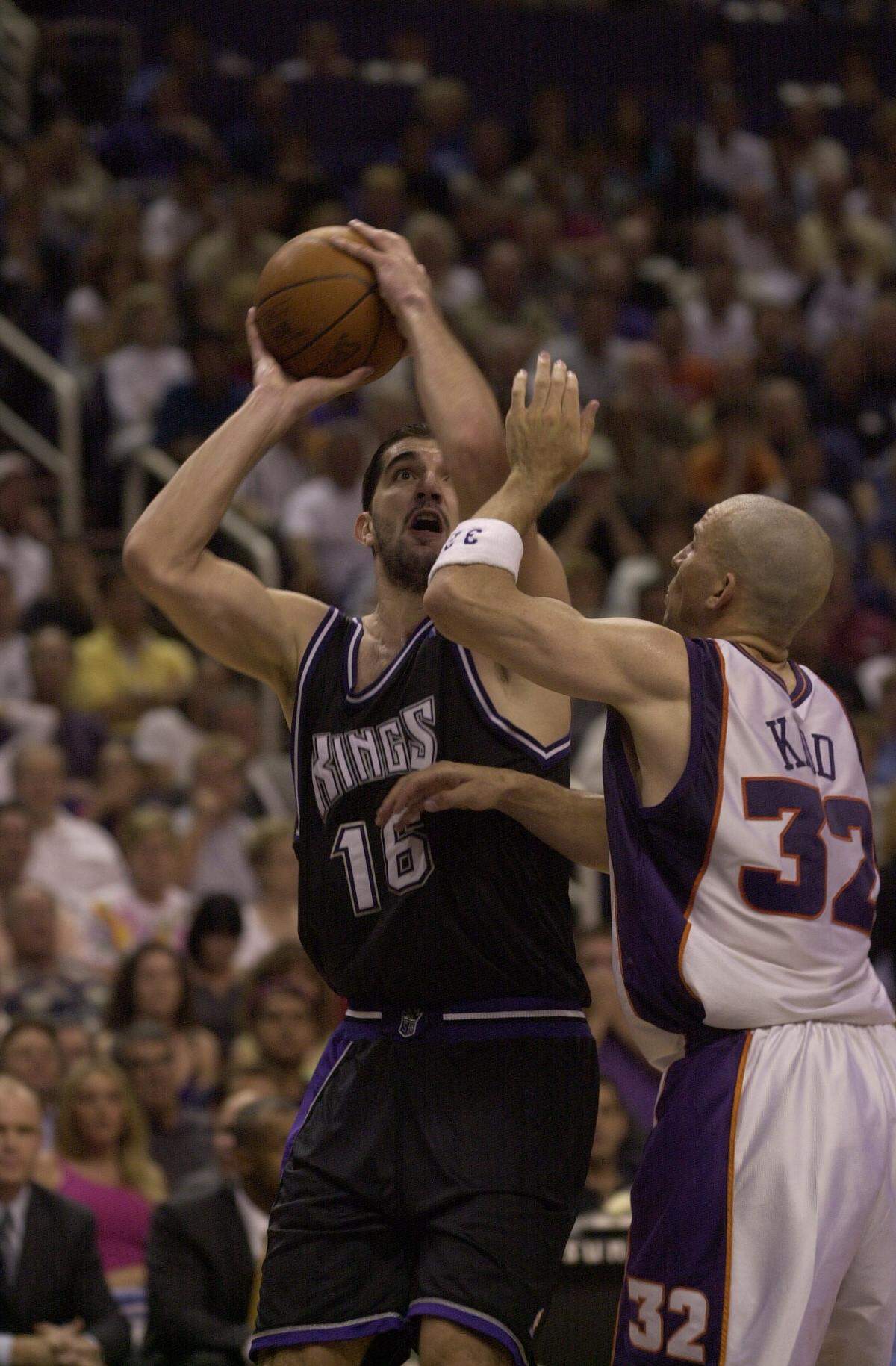 Kings forward Peja Stojakovic shoots over Phoenix Suns guard Jason Kidd in Game 4 of a first-round playoff series May 2, 2001, in Phoenix. Stojakovic’s 37 points helped the Kings win their first playoff series in the Sacramento era.