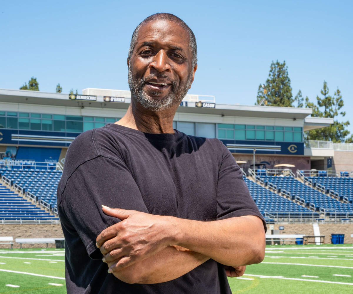 Ronald Austin Jr. poses on the football field at the UC Davis Health Stadium on June 12, 2025.