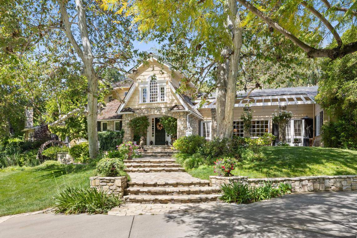 Built for Hollywood director John Houston, the 4.5-acre private compound features a 12,170-square-foot, three-story main residence with six bedrooms, 10 bathrooms, 9 fireplaces, a grand primary suite and an expansive covered deck.