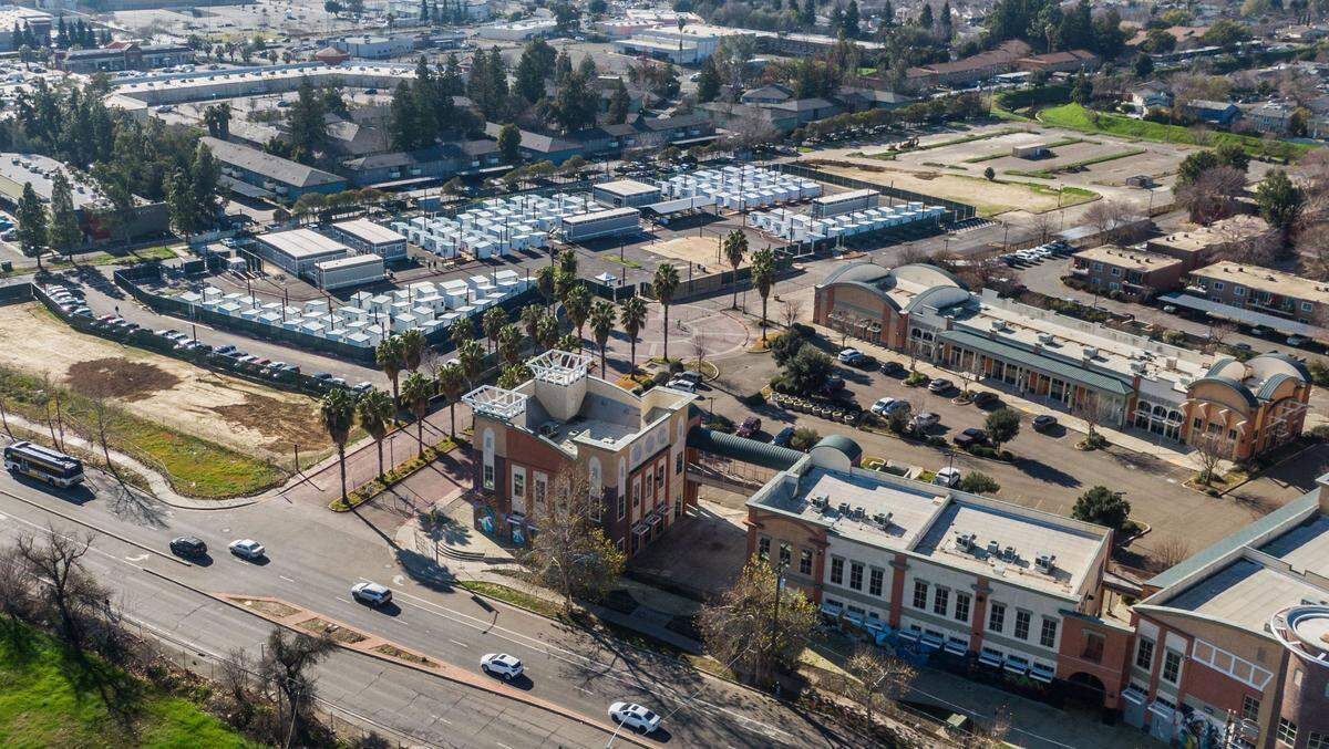 The Stockton Boulevard Safe Stay Community, photographed by drone Wednesday in south Sacramento, opened last month with 155 sleeping cabins, along with a dog-friendly area, dinning, communal showers, bathrooms and a laundry room.