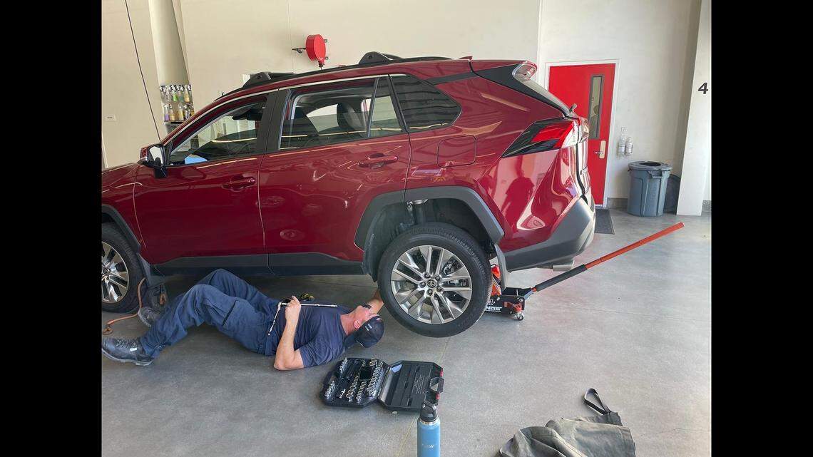 Firefighters with Orange County Fire Authority used various tools to take apart the underside of an SUV, where a kitten had been trapped for hours.
