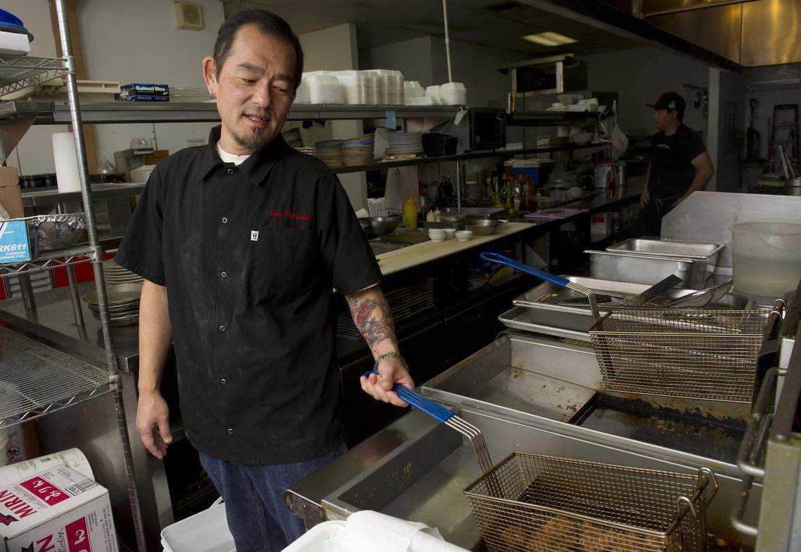 Taka Watanabe prepares Kara Age, the Japanese version of fried chicken on Wednesday, June 19, 2013. After more than 3 decades preparing Japanese fare in Sacramento, Watanabe retired from professionally cooking in October 2025.