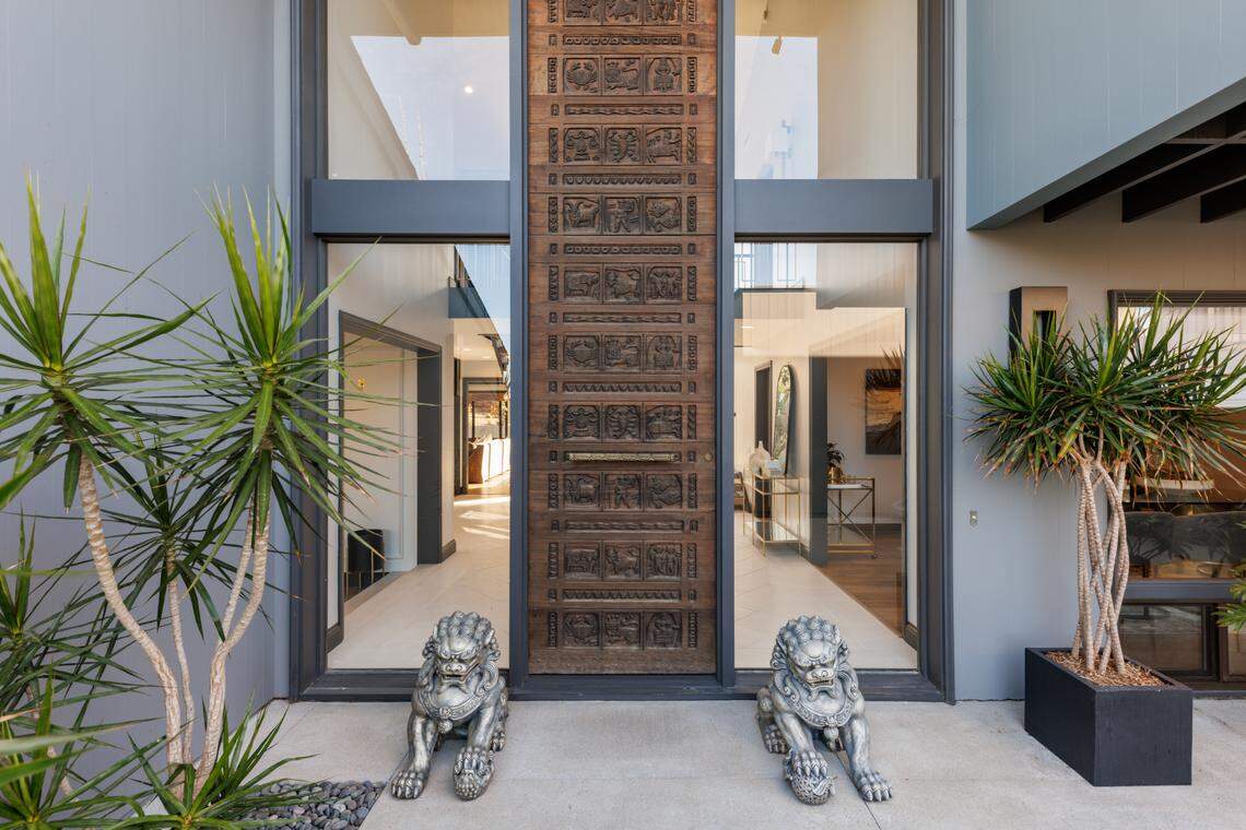 Listed for $3.875 million, the four-bedroom, four-bathroom San Diego residence has a 30-foot-tall front door.