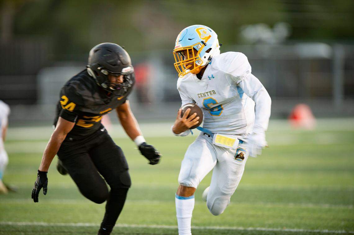 Rio Linda defensive back Johnny Serrano pursues Center quarterback Michael Wortham in 2019. 