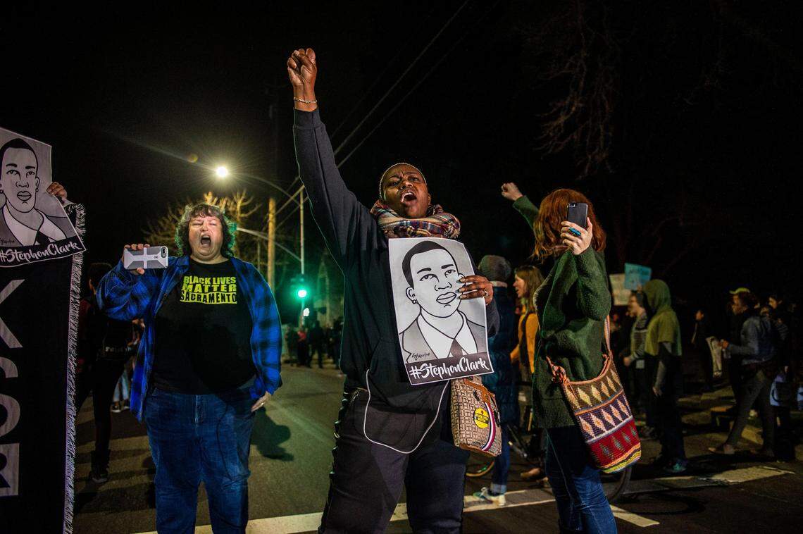 Protesters chant during a march protesting the Sacramento County DA’s decision in the Stephon Clark case Monday, March 4, 2019, in East Sacramento. The march ended with more than 80 people arrested.