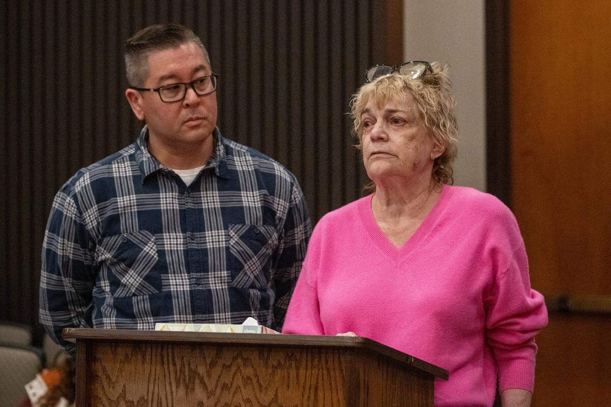 Karsan Elliott, right, speaks to the court about her husband, Charles Starzynski, who was murdered in 2022, before the sentencing of DeSean Leon Brasser Jr. at the Gordon D. Schaber Sacramento County Courthouse on Friday, April 10, 2026. Brasser was sentenced to life in prison without the possibility of parole for the October 2022 murder.