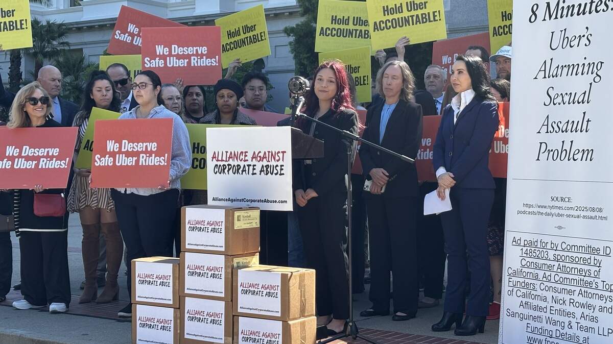 Los Angeles resident Danielle Tudhal speaks on the West Steps of the California Capitol in Sacramento on April 23, 2026. Tudhal was speaking in support of a ballot measure that would increase ride-hailing apps’ liability in cases of sexual assault or misconduct during rides.