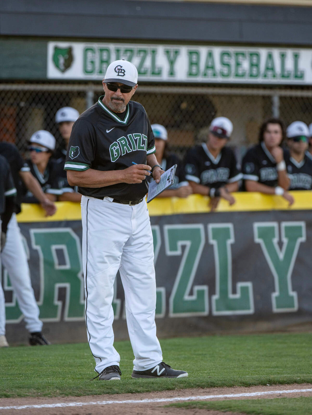 Granite Bay baseball coach Pat Esposito makes a pitching change in a game against Rocklin on Thursday, May 2, 2024 at Granite Bay High School.