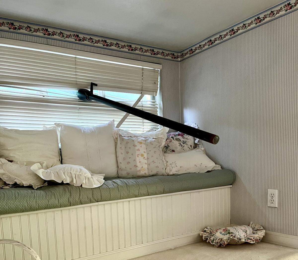 Winds gusts in Citrus Heights sent an umbrella from the backyard of Candy O’Neil into a second-story dormer window at her home on Tuesday.