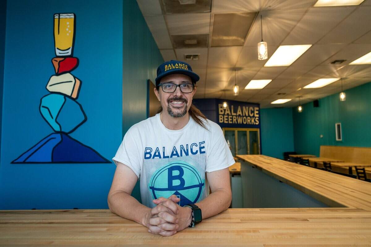 Bryce McEfee, co-owner of Balance Beerworks, a new brewery set to open in the former Device Brewing Co. space in Sacramento, leans on the taproom counter on Monday, June 8, 2026. He is part of a five-member ownership group.
