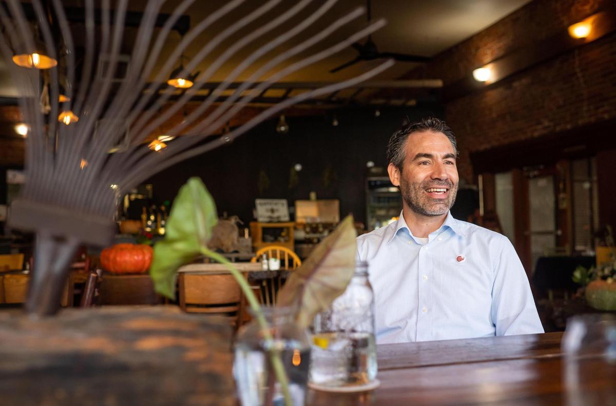 Juan Barajas talks last month about Savory Cafe, his restaurant on Main Street in Woodland. His grandparents came to Yolo County as farmworkers.