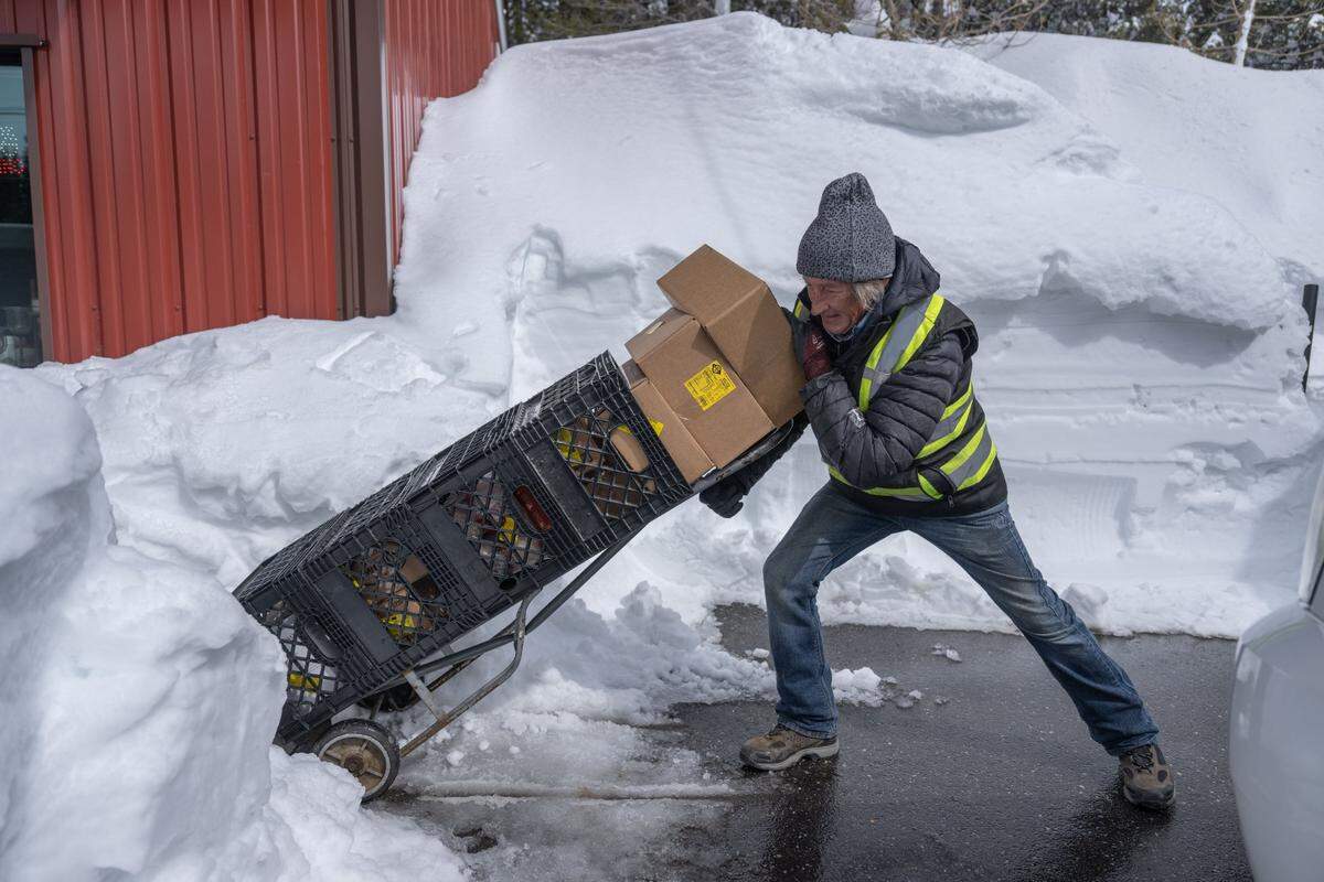 Ben Holder, of Stohlgren Bros. in Truckee, makes a delivery to the Soda Springs Store earlier this month. Holder said he has been busy making deliveries despite the heavy snow that fell in the area.