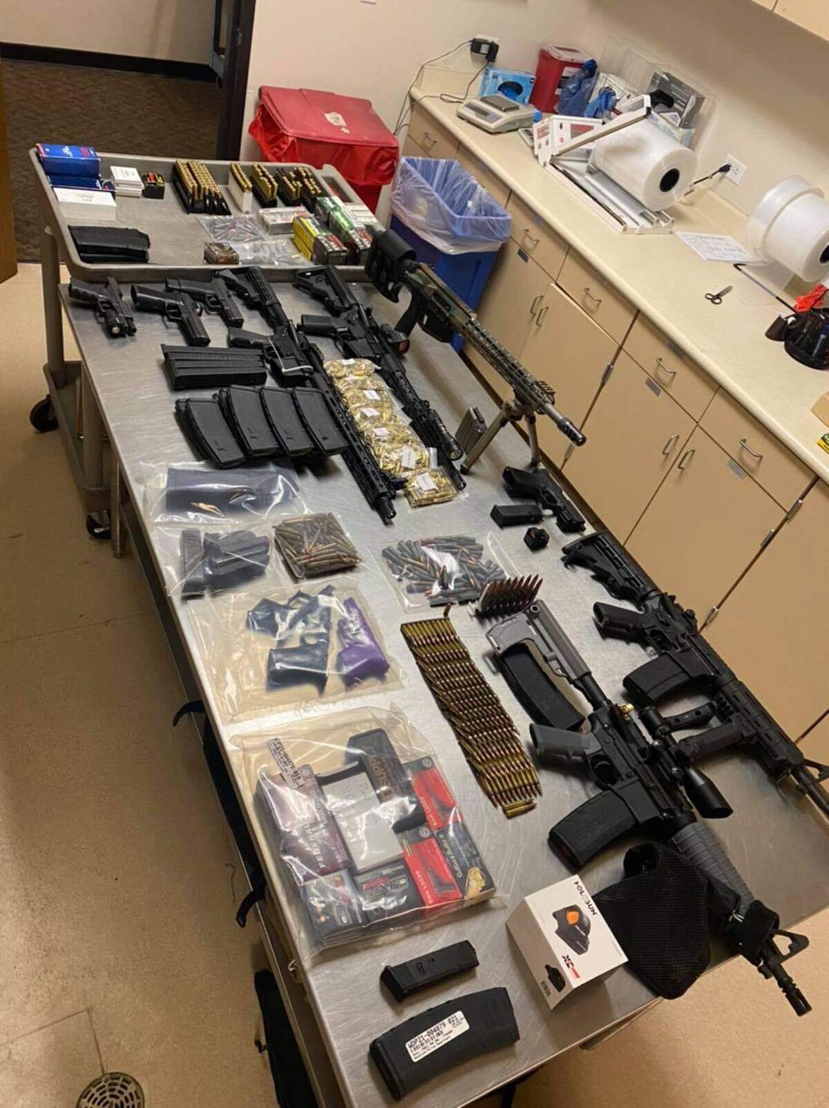 Several illegally possessed guns and ammunition were seized by Woodland police officers.