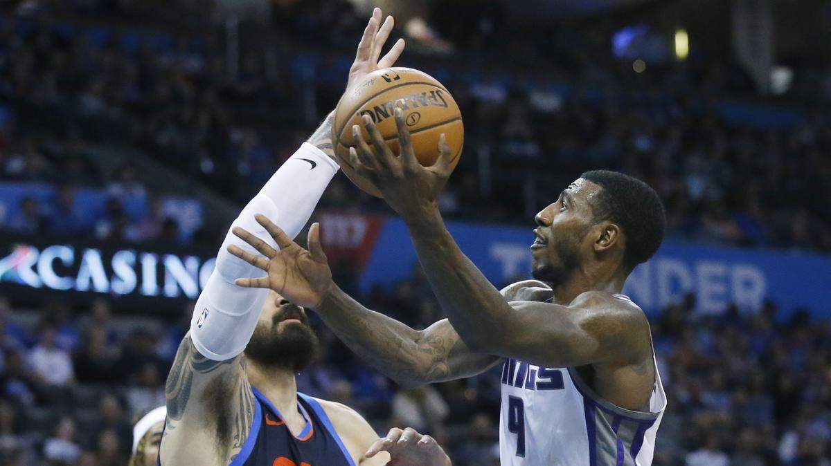 Kings guard Iman Shumpert goes to the basket in front of Oklahoma City Thunder center Steven Adams on Sunday in Oklahoma City. The veteran scored 26 points in the Kings’ 131-120 victory.