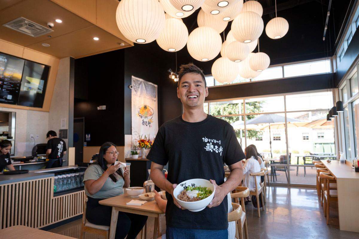 Elk Grove franchisee Alan Lin stands at Kajiken in August. The Michelin-recommended restaurant serves abura soba, Japanese noodles similar to brothless ramen.