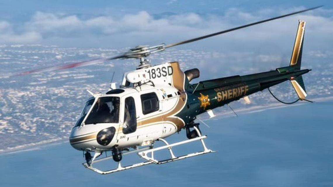 This provided photo shows an Orange County Sheriff’s Department helicopter in California. An Orange County man was arrested on June 10 in connection with shooting at an Orange County Sheriff’s Department helicopter on March 9, feds say.