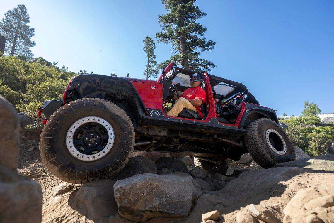Will Barker drives over boulders on the Rubicon Trail during the Jeep Jamboree on June 11 in El Dorado County. The trail has an iconic reputation in the off-roading community.