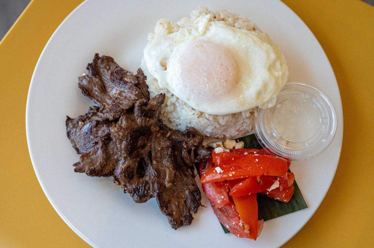 Tapsilog, with marinated beef, garlic fried rice and egg, is available at Spoon and Fork in Sacramento on Thursday.