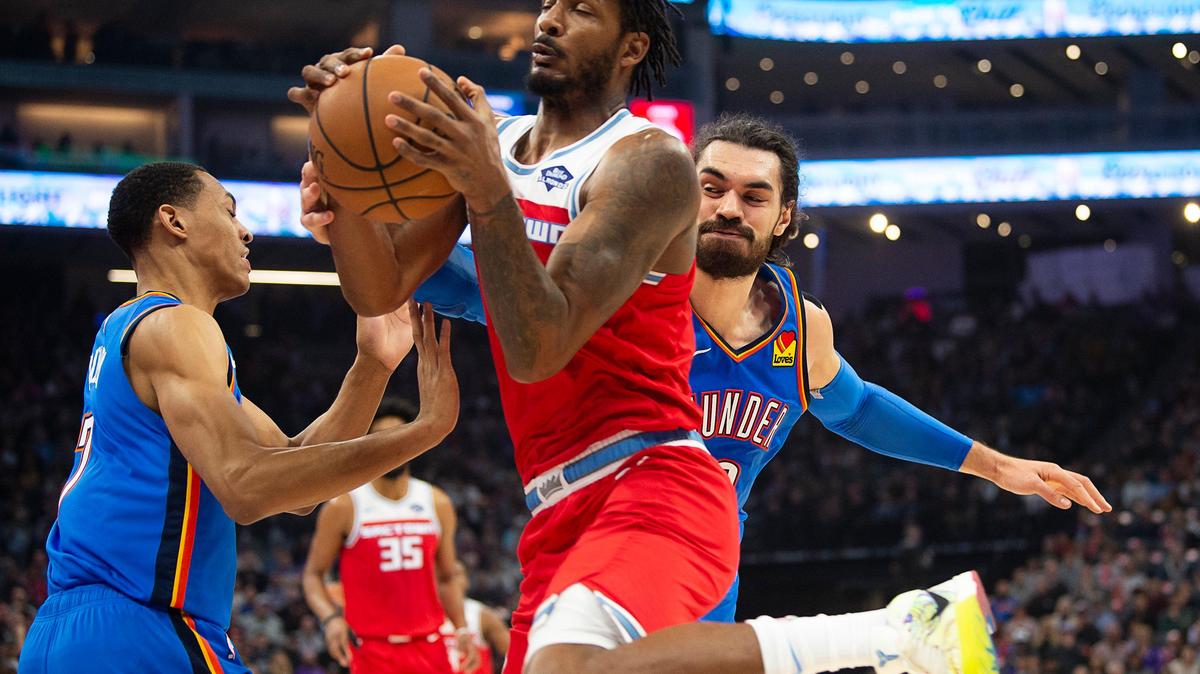 Sacramento Kings forward Trevor Ariza (0) battles Oklahoma City Thunder center Steven Adams (12) during a game at Golden 1 Center on Wednesday, December 11, 2019 in Sacramento.
