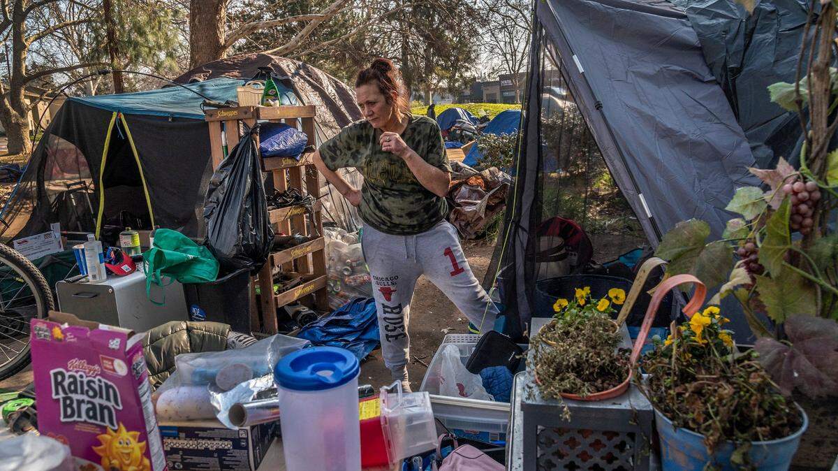 Jamie Gardner, 55, said she would have to return to the river where she feels unsafe if she is evicted from the homeless encampment where she now lives on the corner of Fair Oaks Boulevard and Howe Avenue on Feb. 4, 2022 in Sacramento. The parcel of land where he is camping is owned by the City of Sacramento but the District Attorney’s Office and Sheriff’s Office appear to be preparing to file a lawsuit against the city over the encampment.