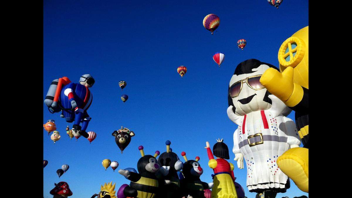 For over 40 years, the Albuquerque International Balloon Fiesta has filled the air with the smell of street vendors and an array of brightly colored hot-air balloons cover the sky.