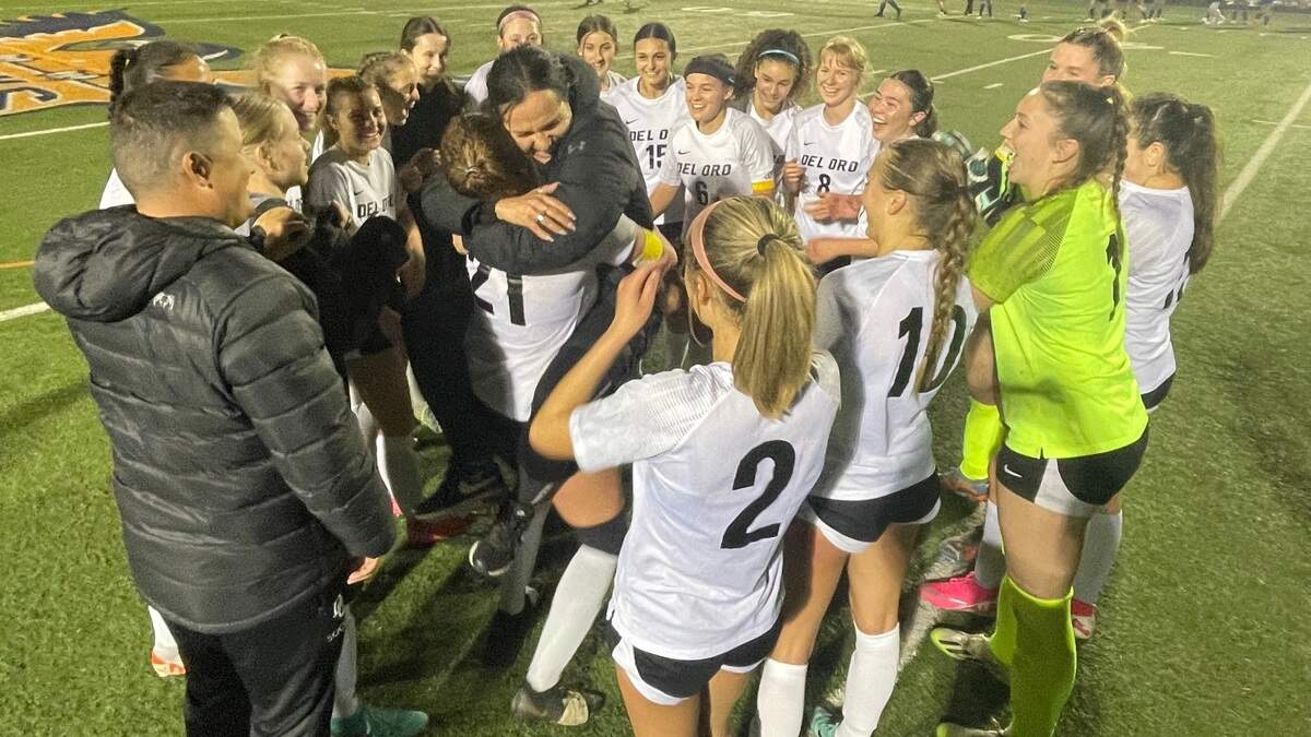 The Del Oro High School girls soccer team celebrates its 1-0 win over Davis in the CIF Sac-Joaquin Section Division I championship game Saturday, Feb. 24, 2024, at Cosumnes River College.