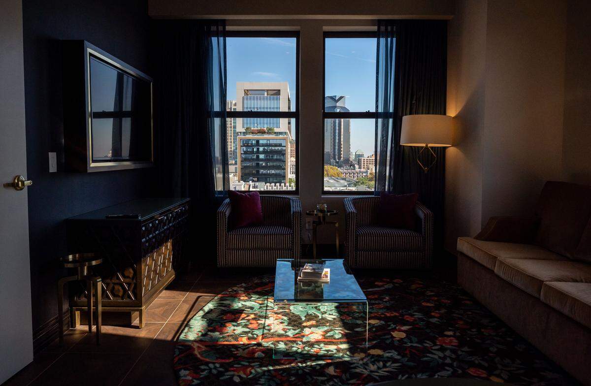 A view of the downtown skyline — and the Kimpton Sawyer hotel&nbsp;— graces  a tenth-floor king suite at The Exchange Sacramento, a boutique hotel part of the Curio Collection by Hilton, in 2021. According to Visit Sacramento, the city and unincorporated Sacramento County have just over 11,500 hotel rooms.