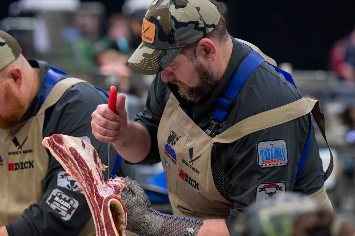 Bryan Butler of the American team makes a cut during the World Butchers’ Challenge at Golden 1 Center in Sacramento on Saturday, Sept. 3, 2022.