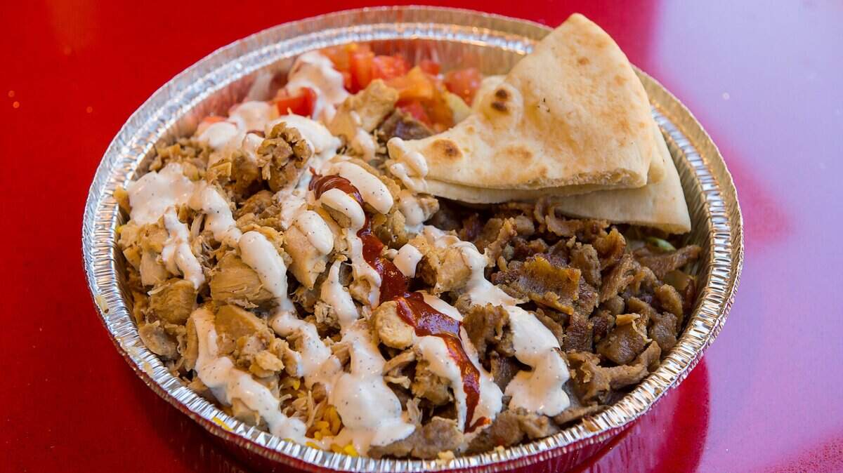 FILE -- The combo chicken and gyro platter from The Halal Guys on Wednesday, June 27, 2018 in Davis.