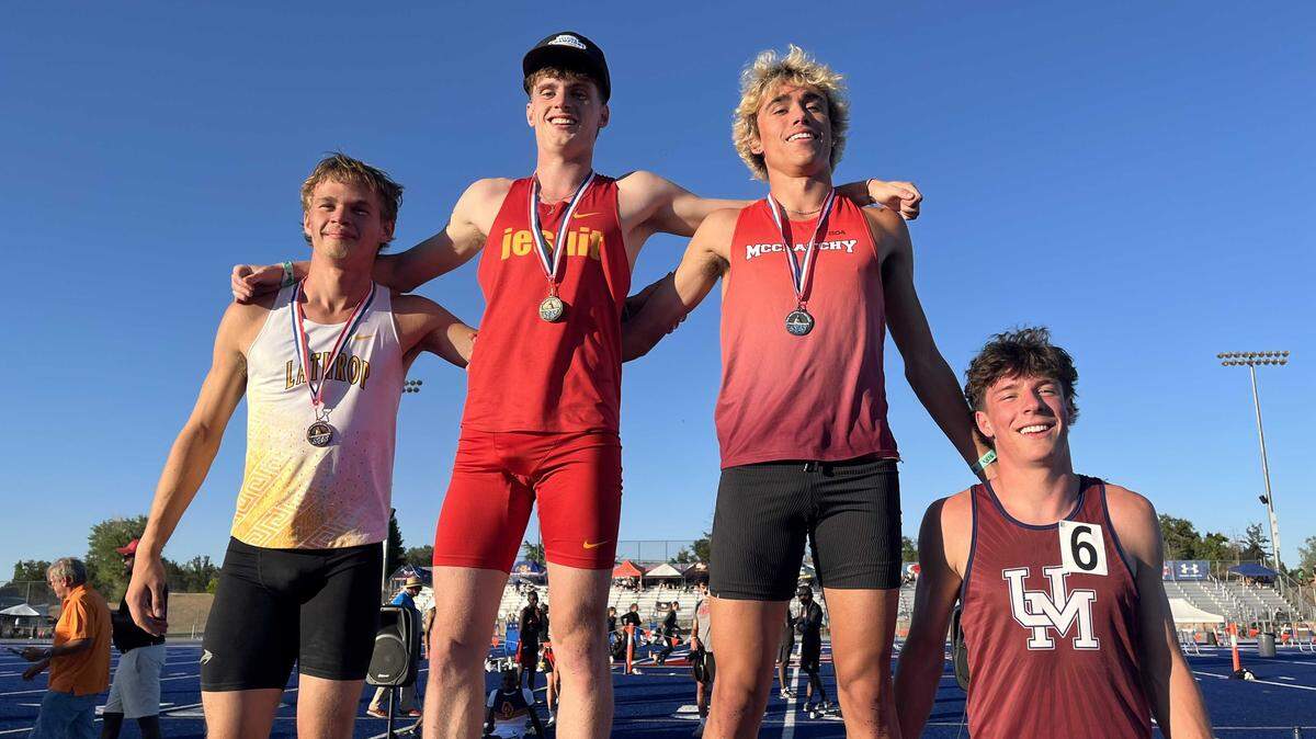 From left, Riley Gier of Lathrop, Lucas Alberts of Jesuit, Hugh Heyer of McClatchy and Patrick Pinjuv of Union Mine stand on the podium after the CIF Masters 800-meter final on Saturday at Prairie City Stadium in Folsom. Alberts defended his Masters title by winning the race in 1:50.10 to advance to the CIF State Track and Field Championships.