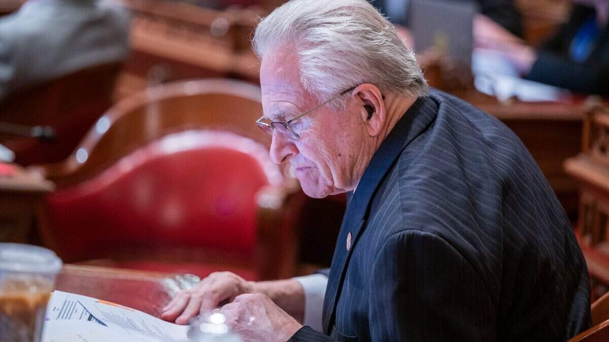 State Sen. Jim Nielsen, R-Red Bluff, looks over a bill during the last day of legislative session on Wednesday, Aug. 31, 2022 in Sacramento. Nielsen, was first elected to the Senate in 1978 and served as its Republican leader in the 1980s, will retire after the session.
