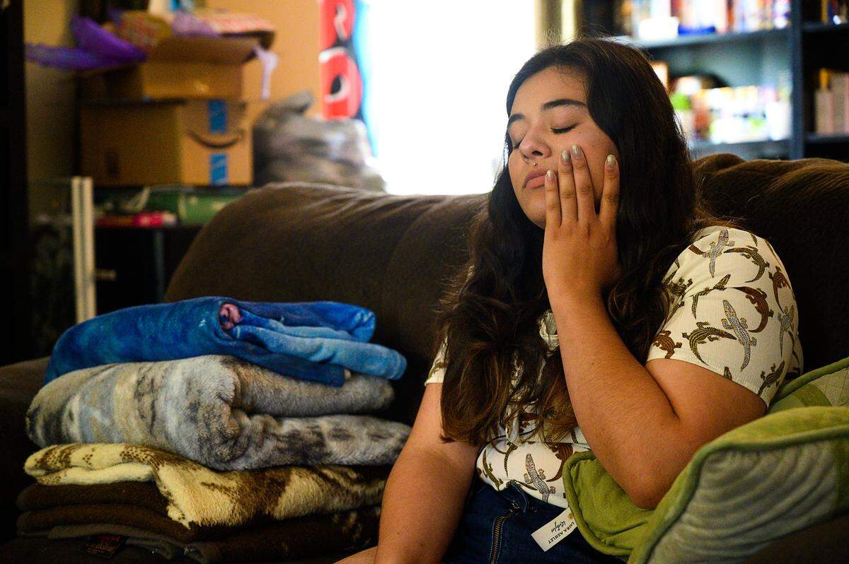 UC Davis marching band member Christina Peña was given the Wise-Ass Freshman Award, which included a shirt that she said had been stained with a variety of bodily fluids over the years.