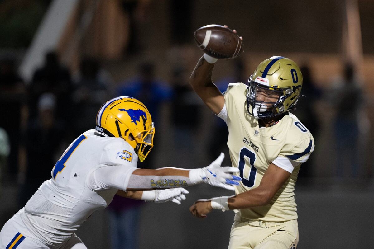 West Park Panthers quarterback Jaden Jackson (0) evades Grant High Pacers linebacker Ernie Tofi (4) in October. 