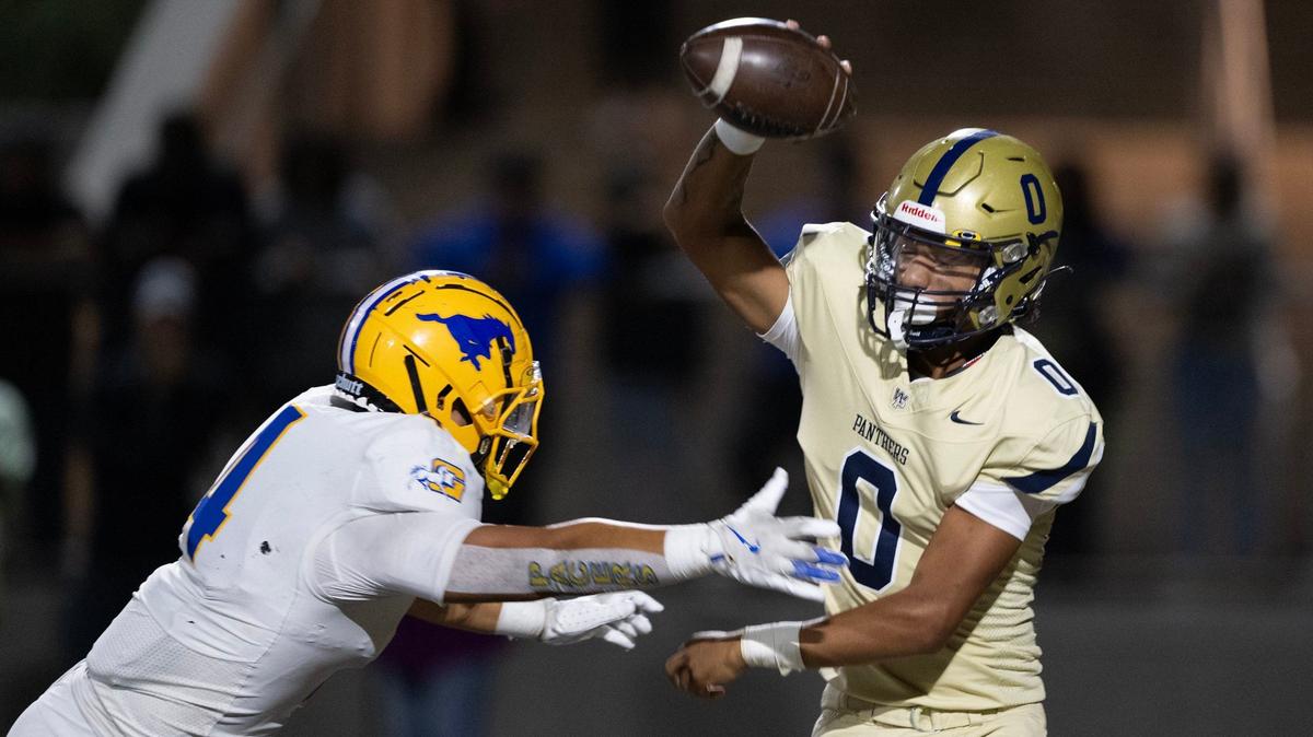 West Park Panthers quarterback Jaden Jackson (0) evades Grant High Pacers linebacker Ernie Tofi (4) in the first half on Friday, Oct. 11, 2024 in Roseville.